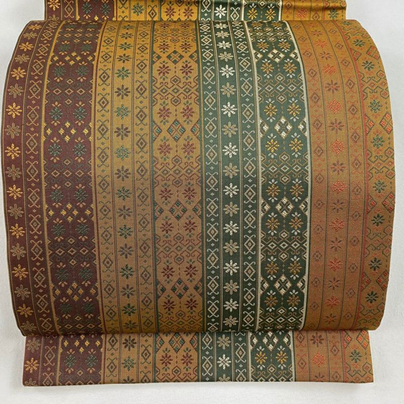 正絹 袋帯 多様な模様 ブラウン系 袋帯 美品 秀品 花 幾何学 茶色 全通 正絹｜中古・古着