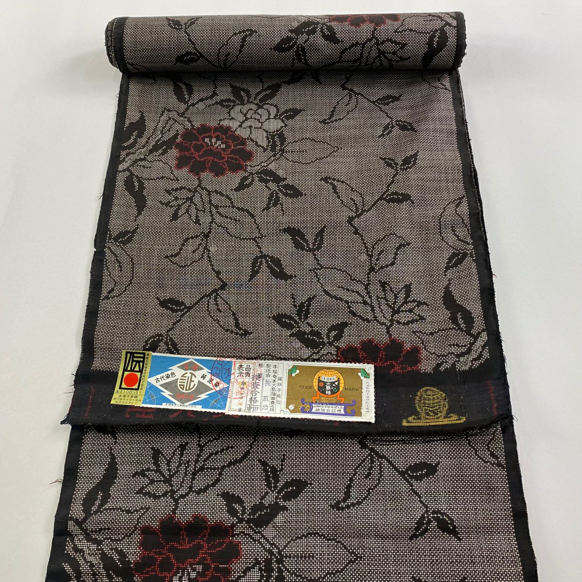 反物 秀品 大島紬 証紙 純泥染 草花 焦茶色 正絹｜中古・古着