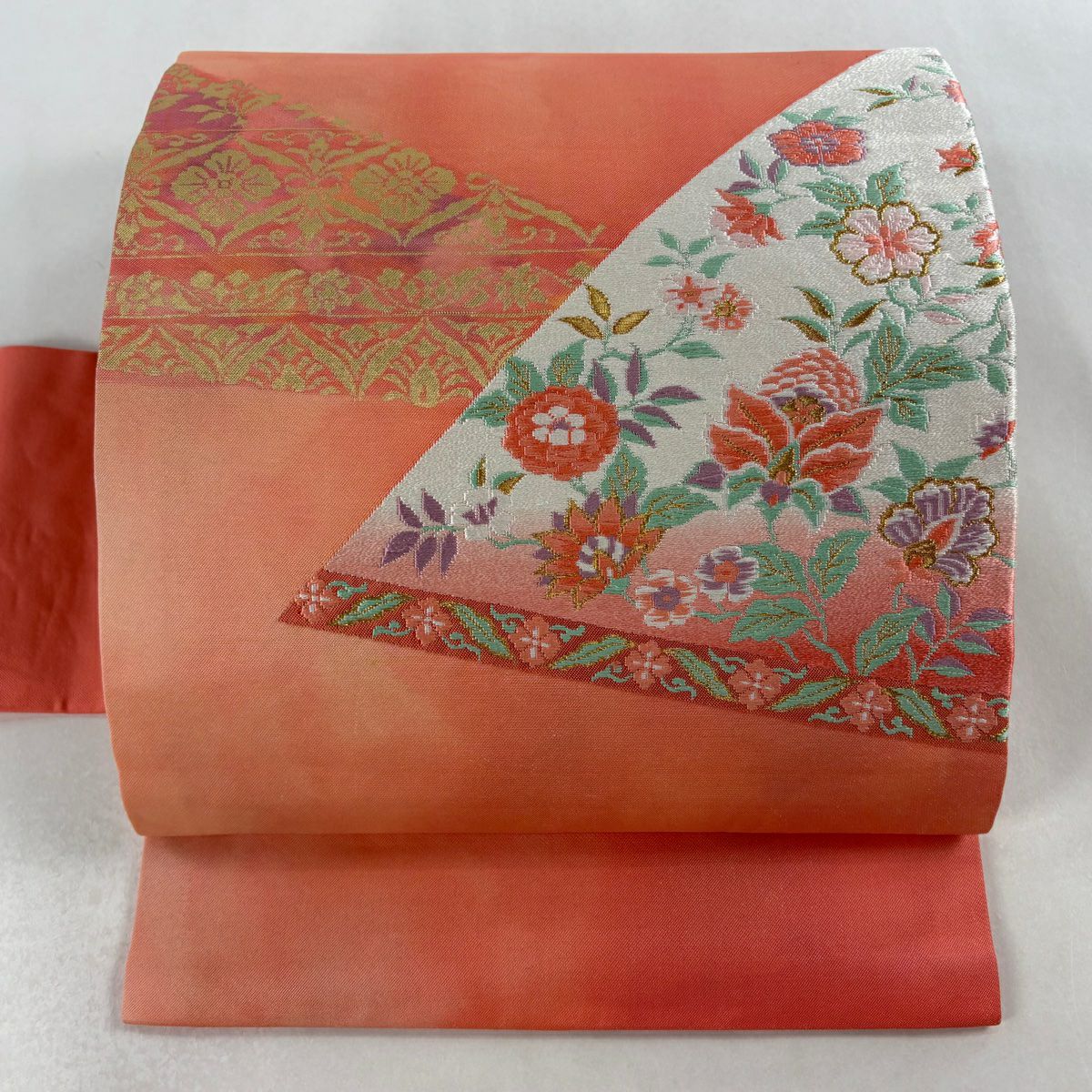 名古屋帯 秀品 草花 花唐草 金糸 刺繍 サーモンピンク 正絹｜中古
