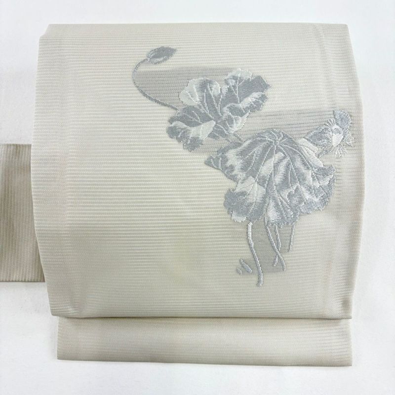 美品】 名古屋帯 秀品 落款 夏帯 草花 銀糸 銀彩 ベージュ 正絹 【中古】