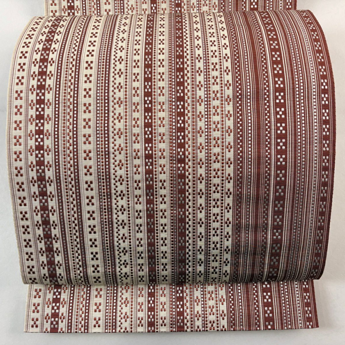 美品】 名古屋帯 優品 紬地 松葉仕立て 八寸名古屋帯 赤茶 正絹｜中古