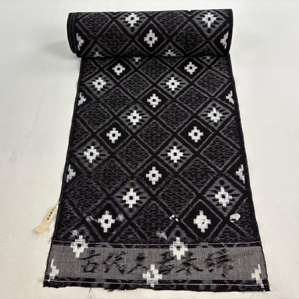 反物 逸品 紬 久留米絣 証紙 十字絣 流水 深緑 綿｜中古・古着