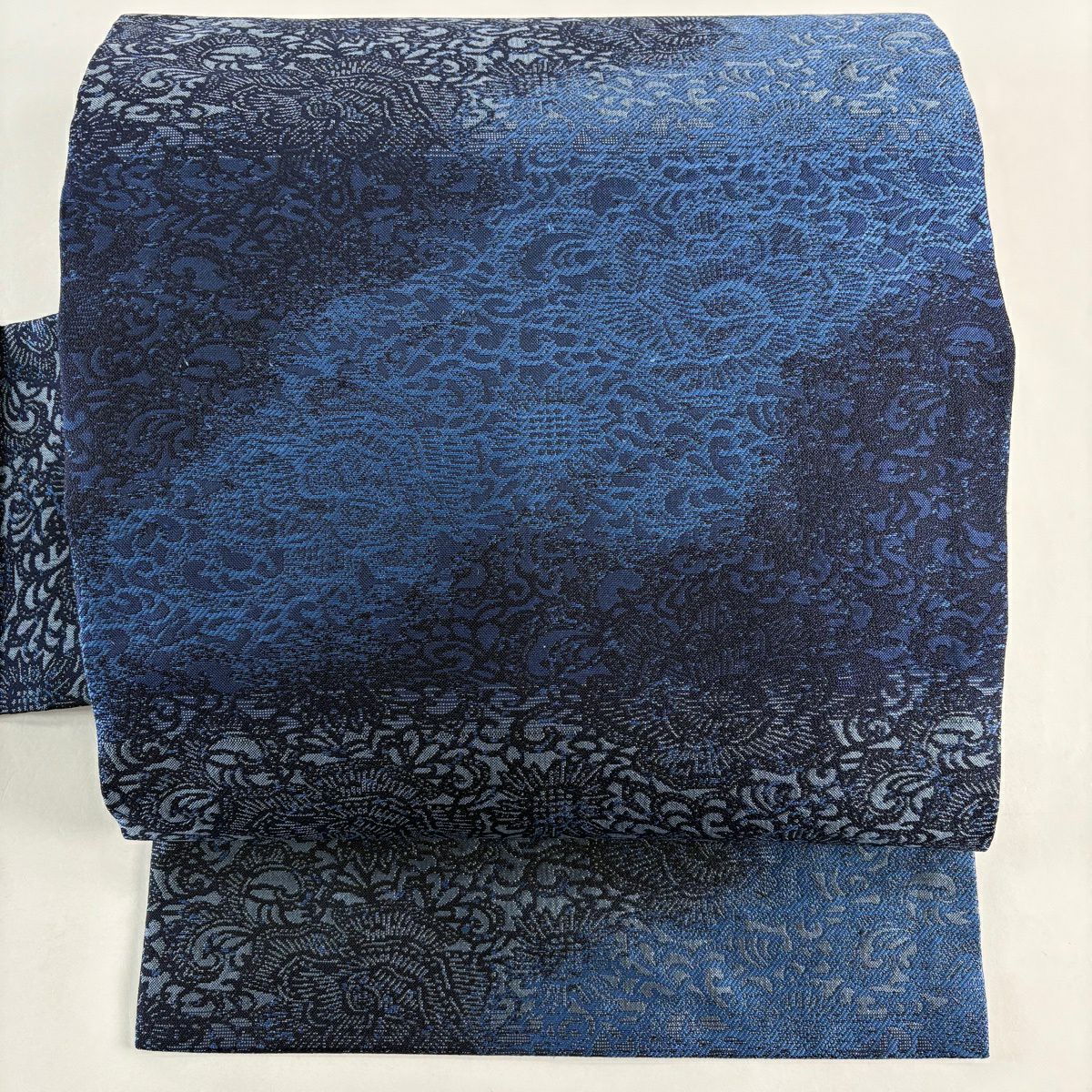 美品】 袋帯 名品 紬地 縞 花唐草 藍色 全通 正絹 ｜中古・古着
