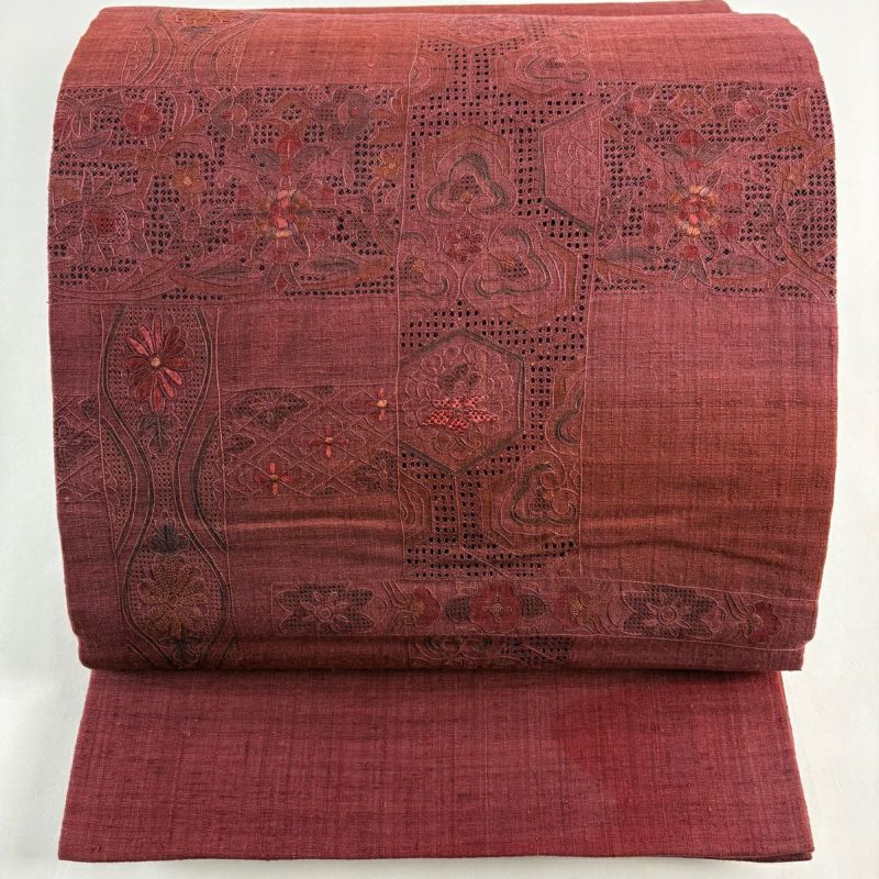 袋帯 秀品 紬地 華文 亀甲 刺繍 えんじ色 お太鼓柄 正絹｜中古・古着
