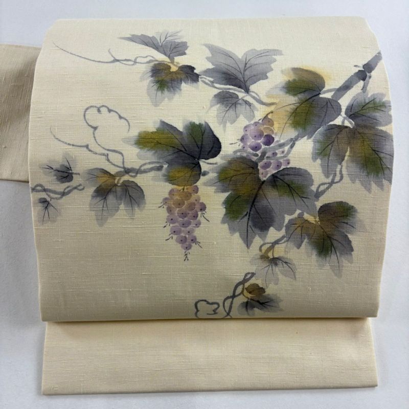 名古屋帯】手織り紬 抽象果物模様 ベージュ 刺繍 カジュアル