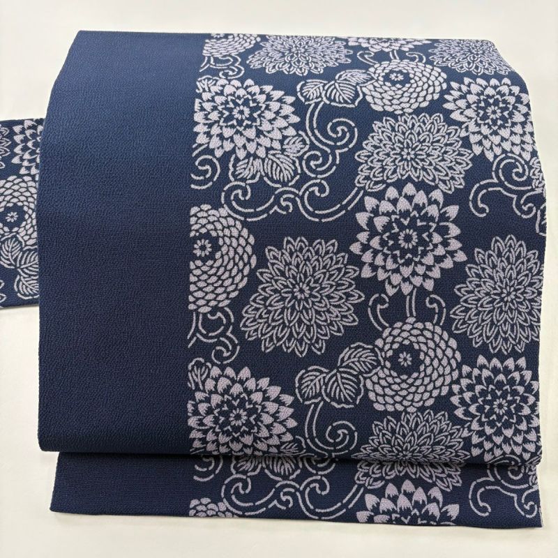 名古屋帯 美品 秀品 落款あり 伊勢型染 菊唐草 縮緬 紺色 正絹