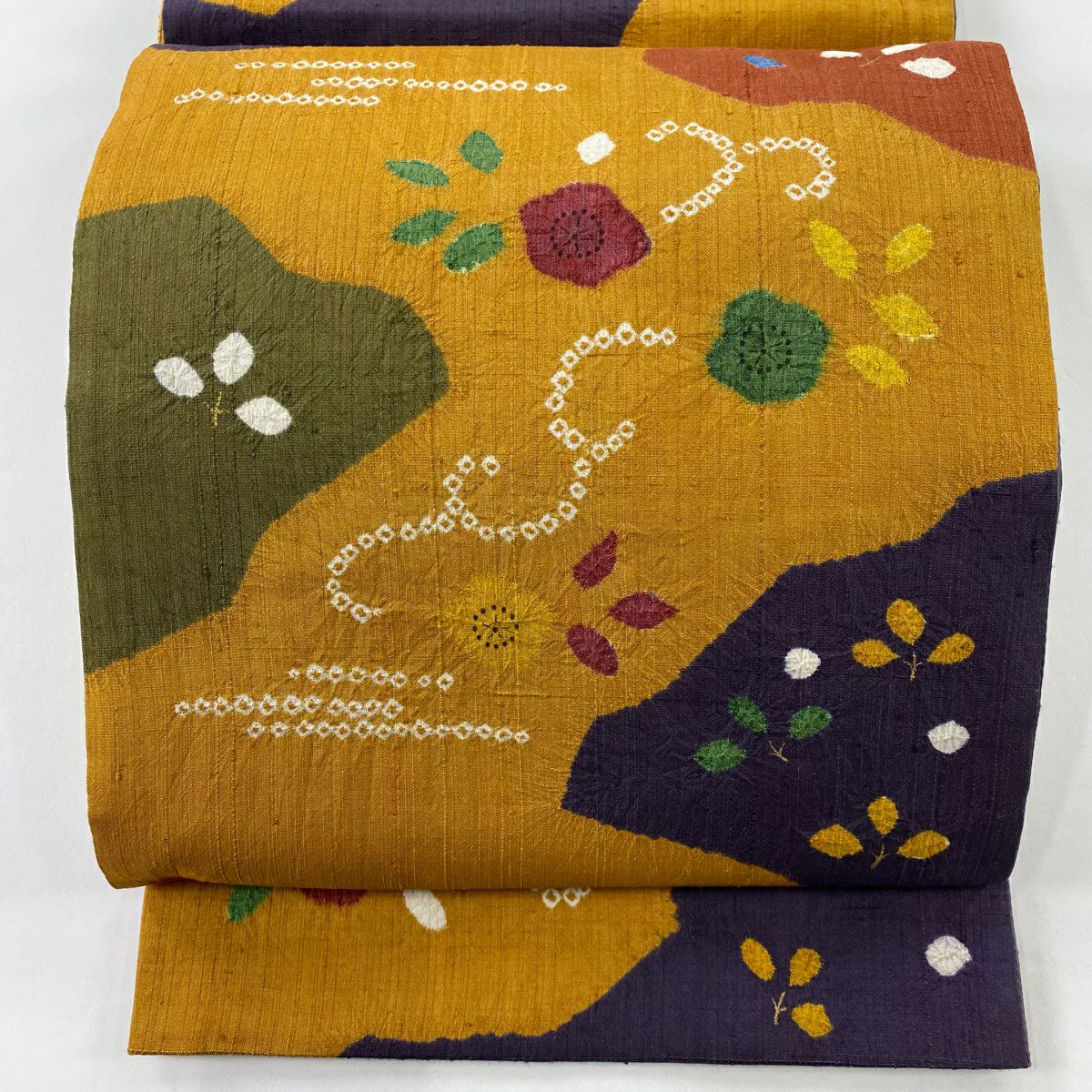 袋帯 美品 秀品 落款あり 彩美染 紬地 草花 幾何学 金彩 青紫