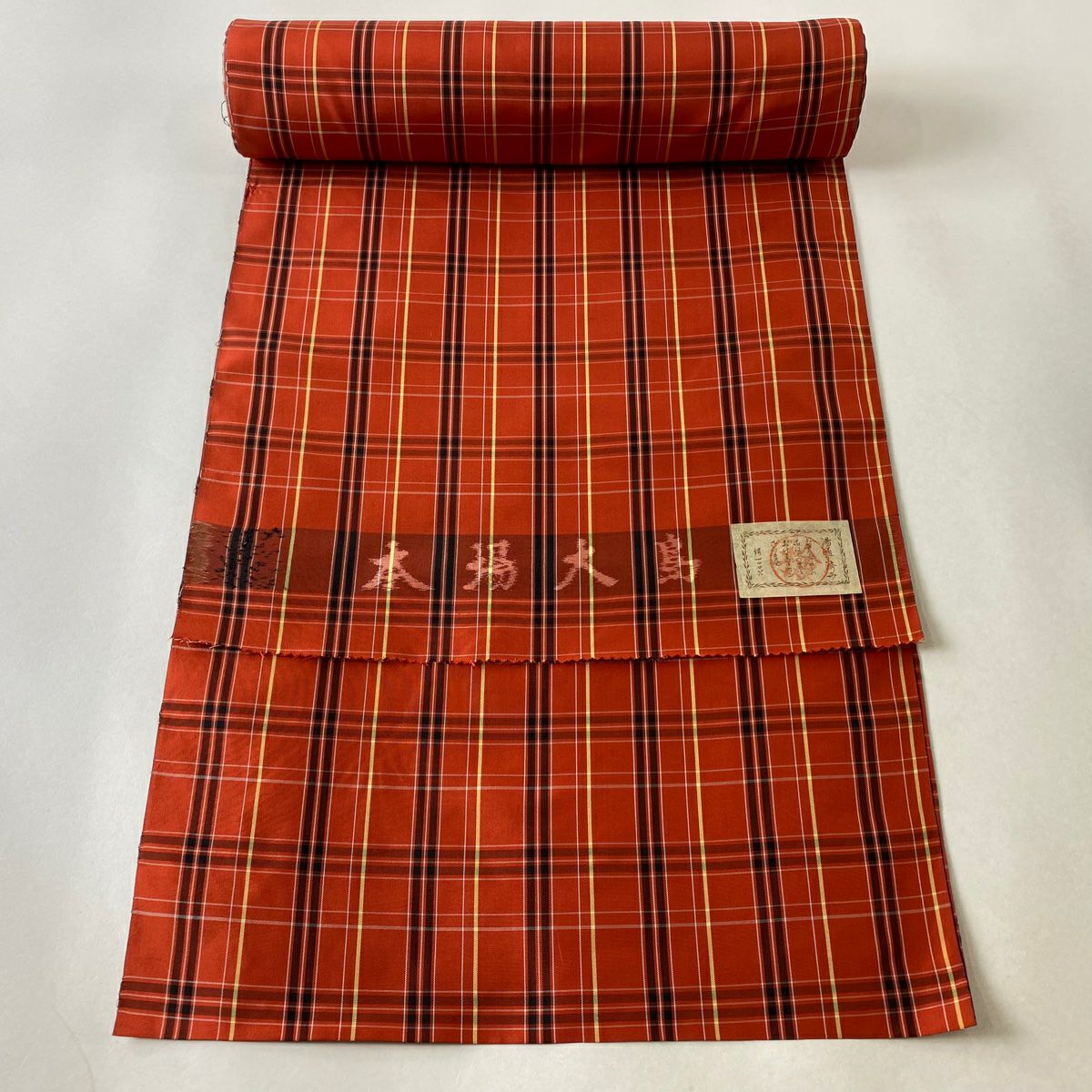 新品・正絹】定価19 大島紬反物 藍色 亀甲赤花柄