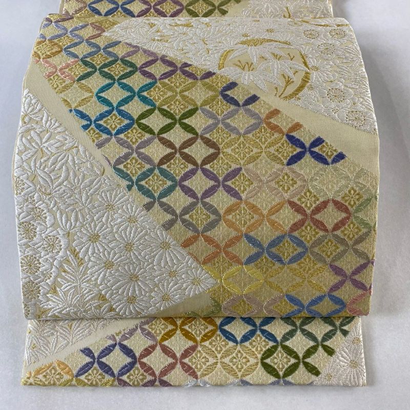 袋帯 美品 逸品 七宝 花丸文 金糸 唐織 ベージュ 六通 正絹