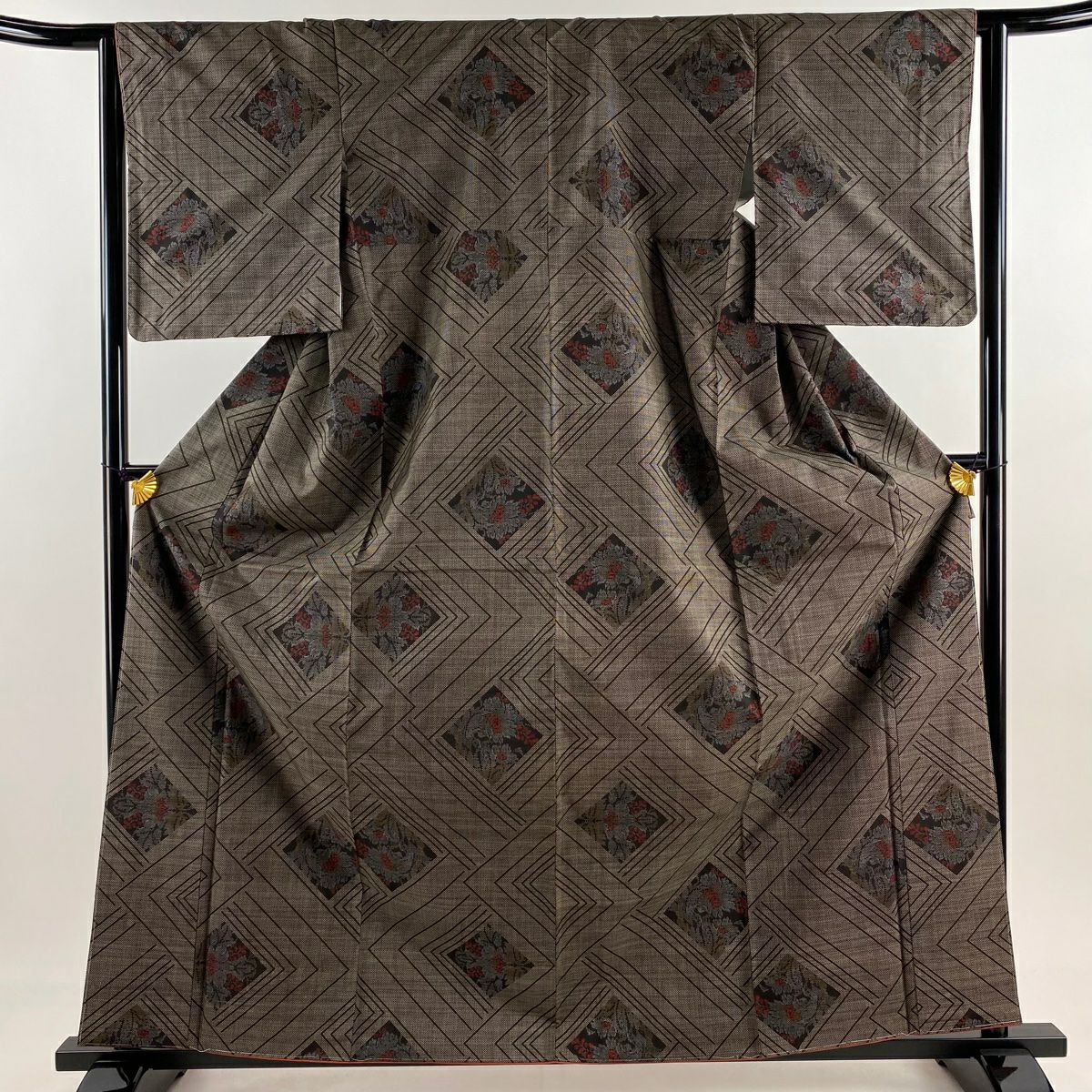 大島紬 身丈162cm 裄丈64cm M 袷 純泥染 証紙あり 幾何学模様 焦茶色