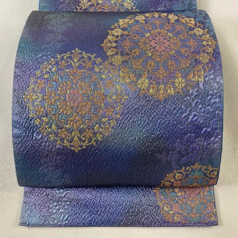 袋帯 美品 逸品 華文 花唐草 ラメ糸 箔 青紫 六通 正絹｜中古