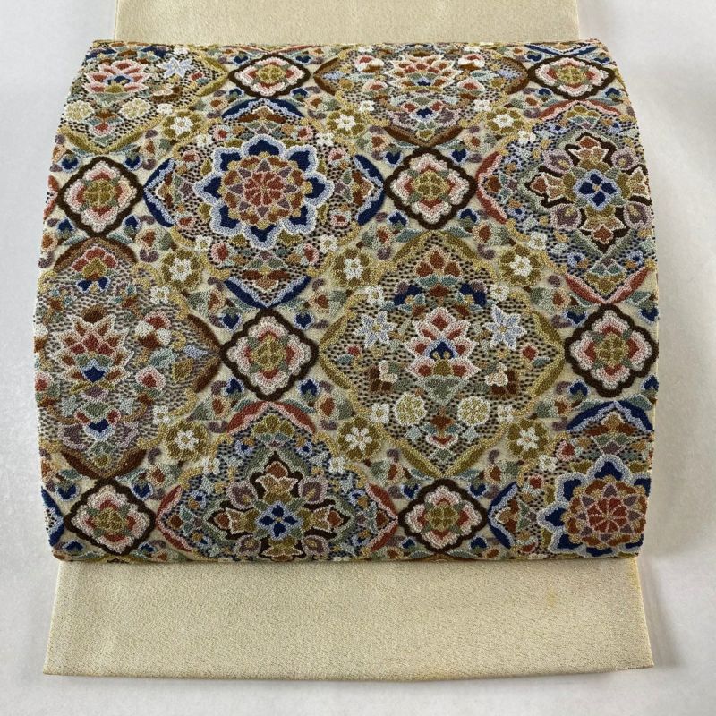 袋帯 美品 逸品 引箔本金紹巴 菱重ね鏡文 金糸 金色 お太鼓柄