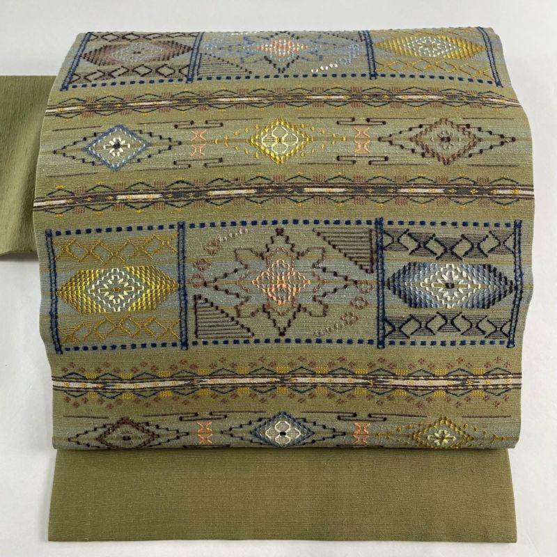 名古屋帯】紬地 市松花唐草仕覆文 生成り 美品 銘品