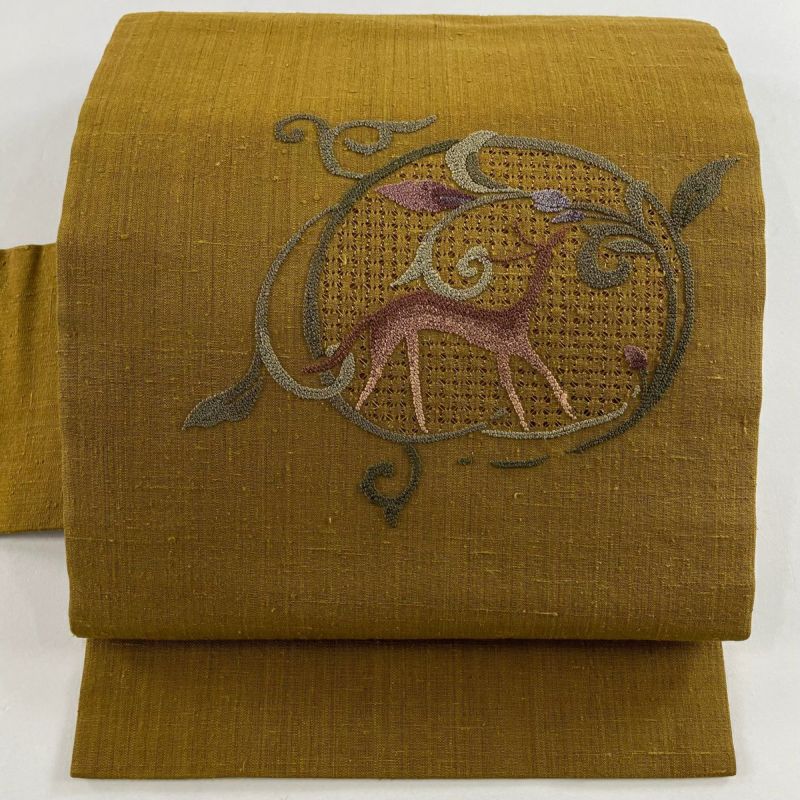 名古屋帯 美品 秀品 紬地 花唐草 鹿 相良刺繍 山吹茶色 正絹