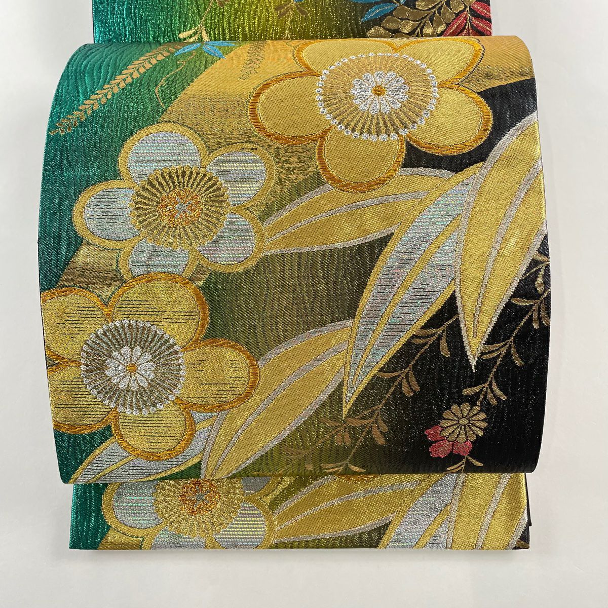 袋帯 美品 秀品 笛 草花 金糸 箔 茶色 六通 正絹 【中古】