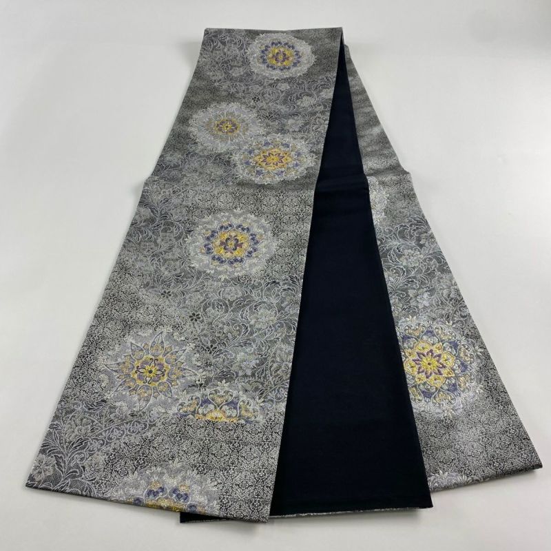 袋帯 美品 名品 華文 草花 箔 ラメ糸 銀色 六通 正絹｜中古