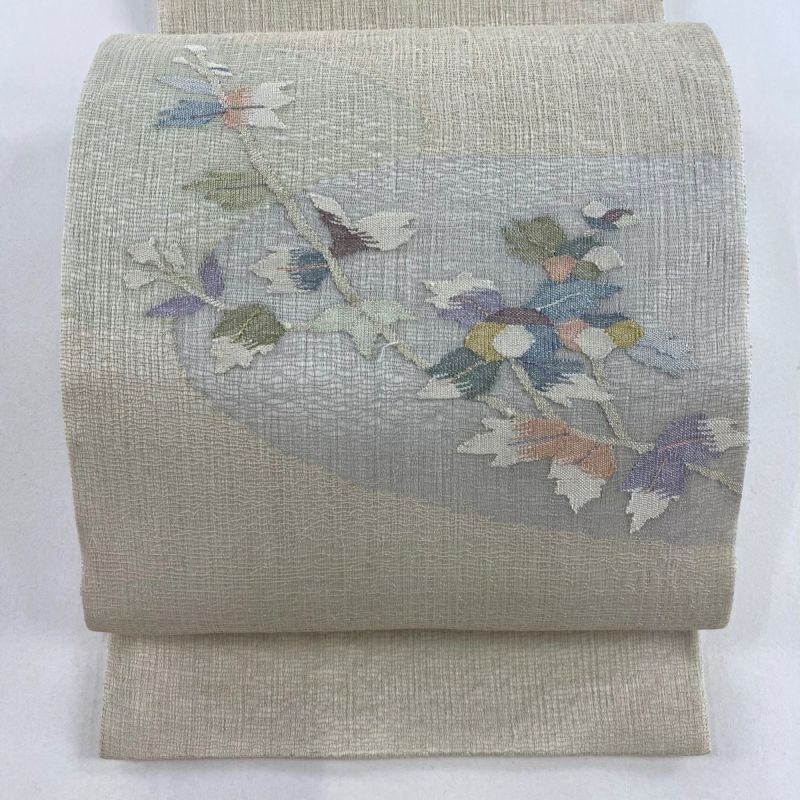 袋帯 太鼓柄 手描き 木々 花畑 24M473f 袋帯 秀品 夏帯 枝花 銀糸 ベージュ お太鼓柄 正絹｜中古・古着