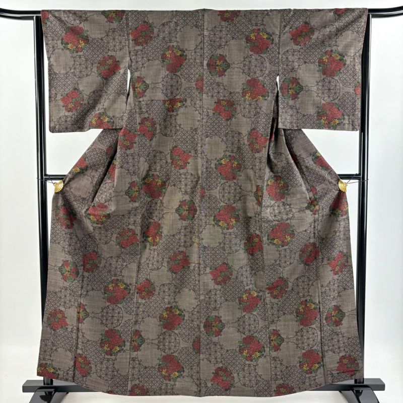 紬 身丈161.5cm 裄丈64cm M 袷 雪輪 草花 焦茶色 正絹 秀品