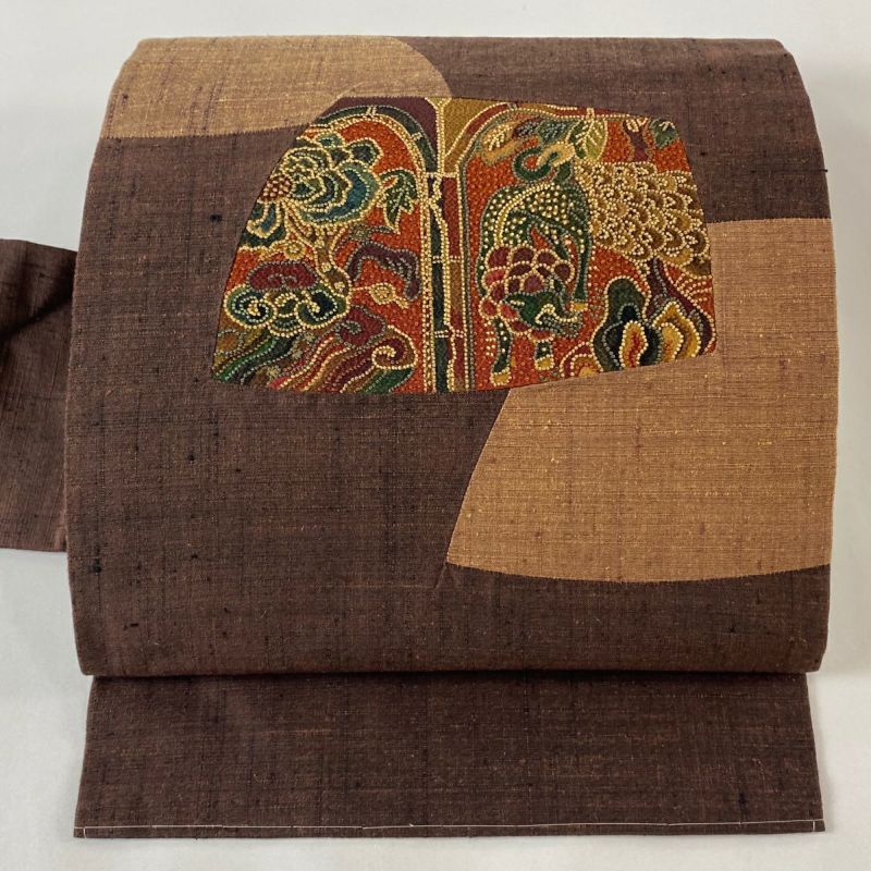 正絹　繼れ織り　名古屋帯(淡い茶系ゴールド　刺繍)　￥200,000の品 引箔：総刺繍」 生成り 煌びやかな 正絹 九寸 名古屋帯