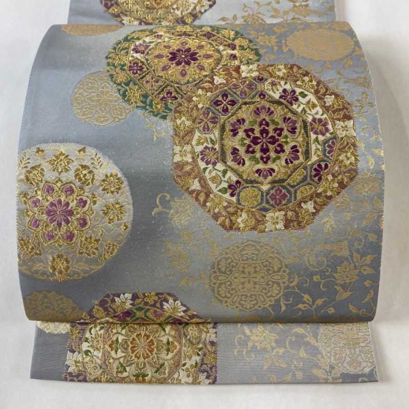 袋帯 美品 逸品 じゅらく 落款あり 帝王紫 華文 花唐草 金糸 箔