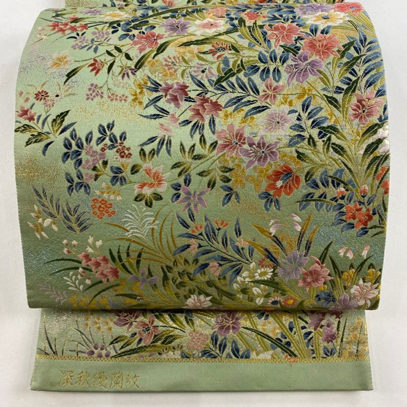 花唐草袋帯、半襟2点セット 袋帯 美品 名品 深秋優蘭紋 草花 唐織 箔 薄緑 六通 正絹｜中古