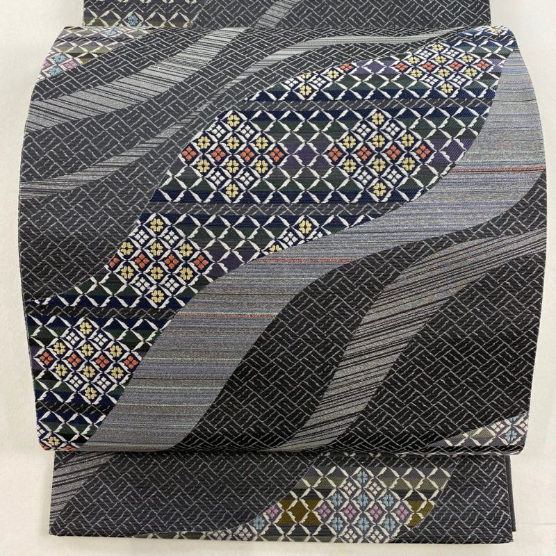 袋帯 美品 名品 風のささやき 七宝 波 箔 灰色 六通 正絹｜中古