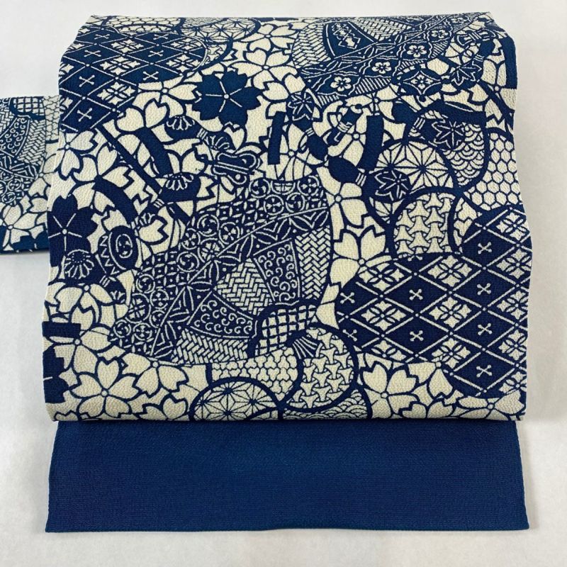 名古屋帯 美品 秀品 桜 鞠 縮緬 紺色 正絹|中古・古着 名古屋帯 美品 秀品 桜 鞠 縮緬 紺色 正絹|中古・古着
