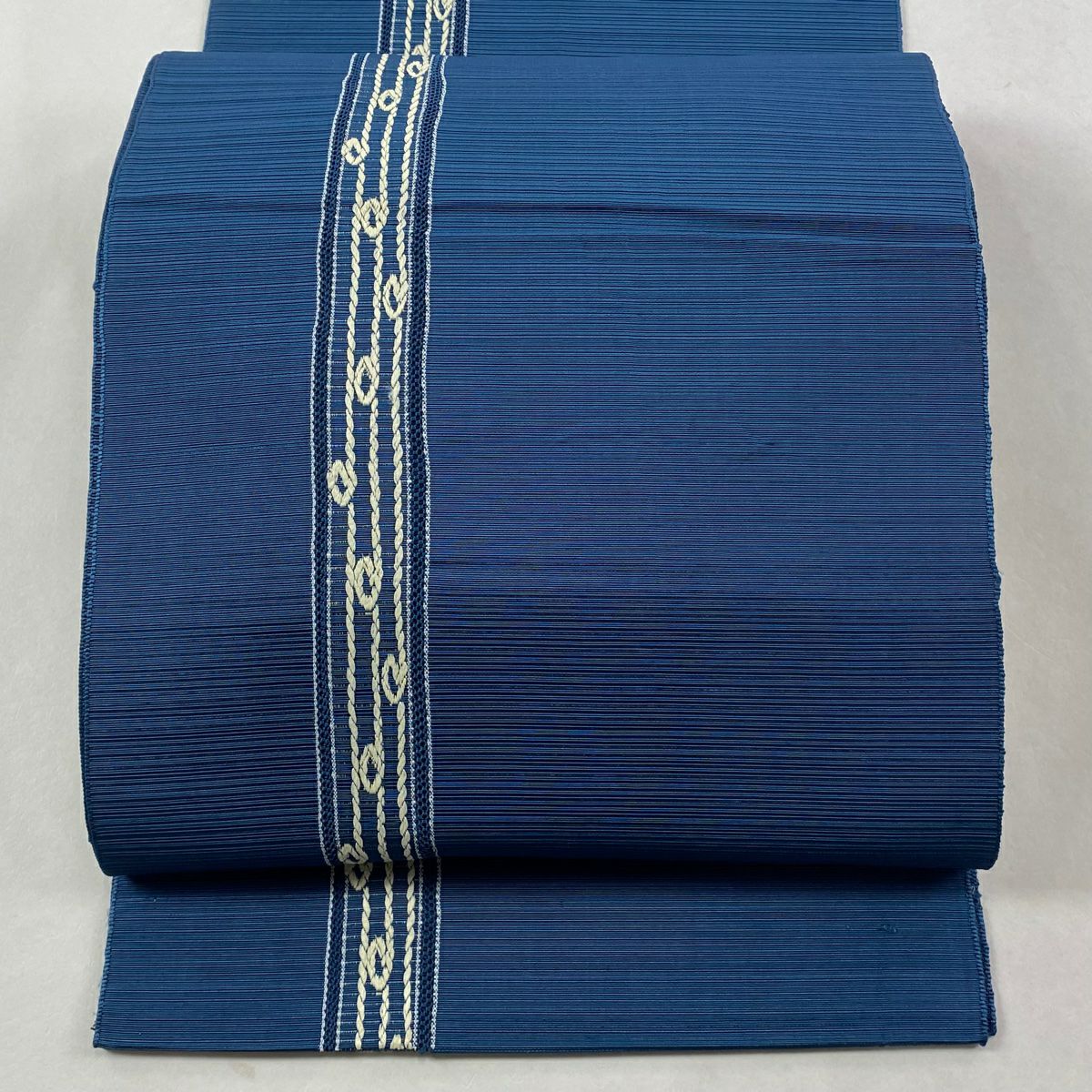 反物 秀品 付下げ 草木染 松 藤 相良刺繍 薄オレンジ 正絹｜中古・古着